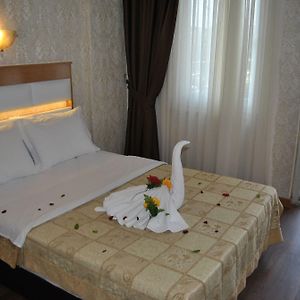 Kamer met een Queen Size Bed